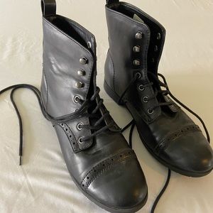 Black lace up boots with vintage accents